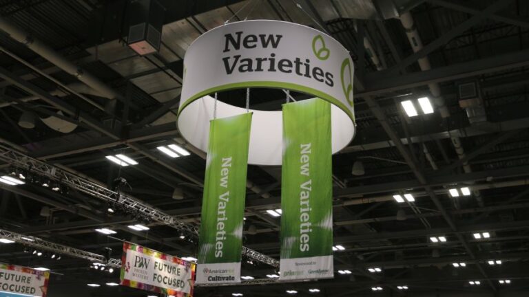 New Varieties Zone hanging banners at trade show floor section at Cultivate24